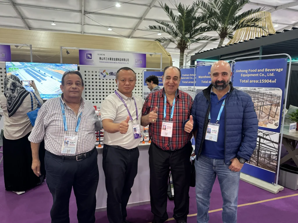 Customers discussing steel structure building projects with Foshan Bingfa