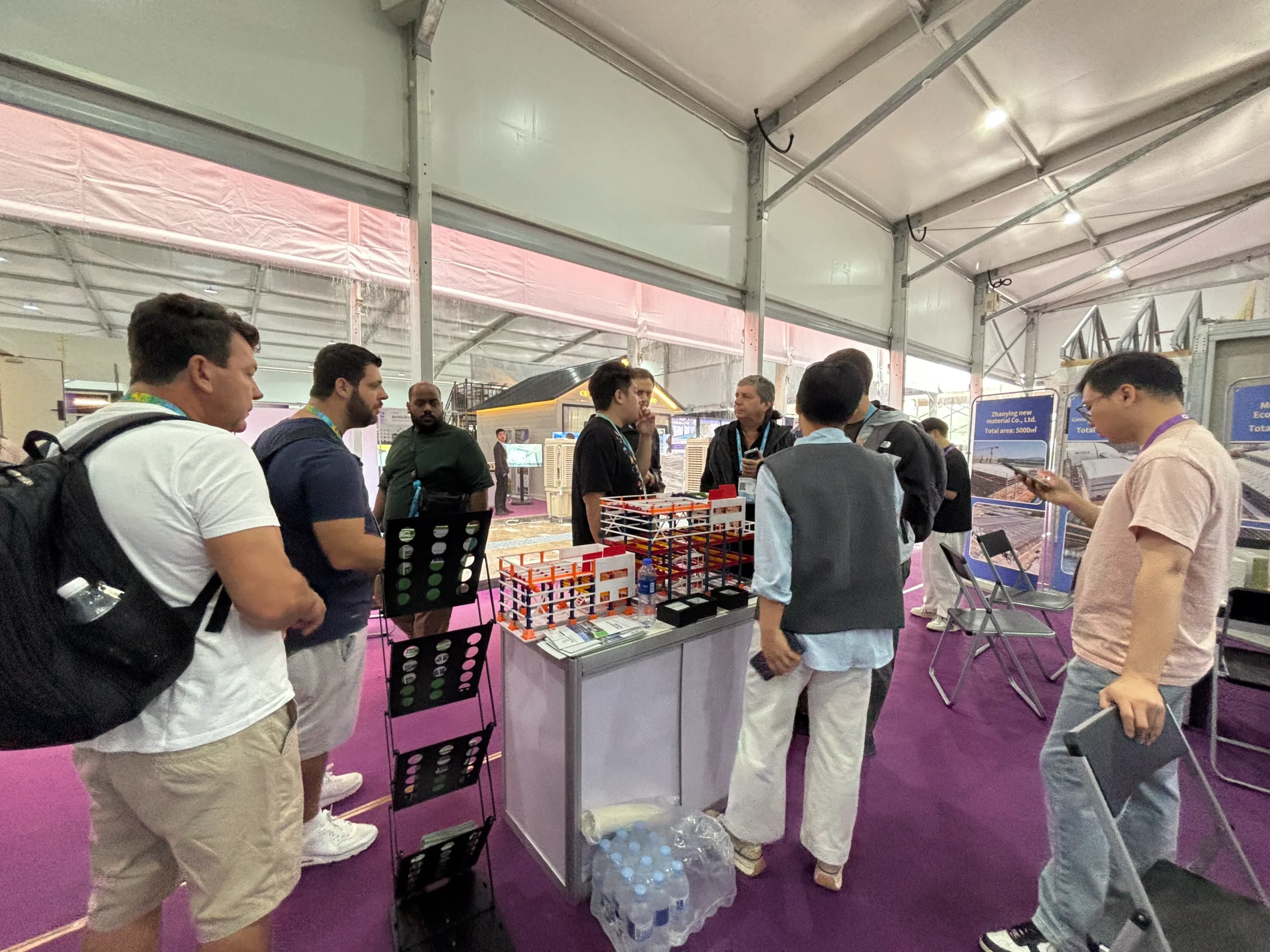 Customers discussing steel structure building projects with Foshan Bingfa