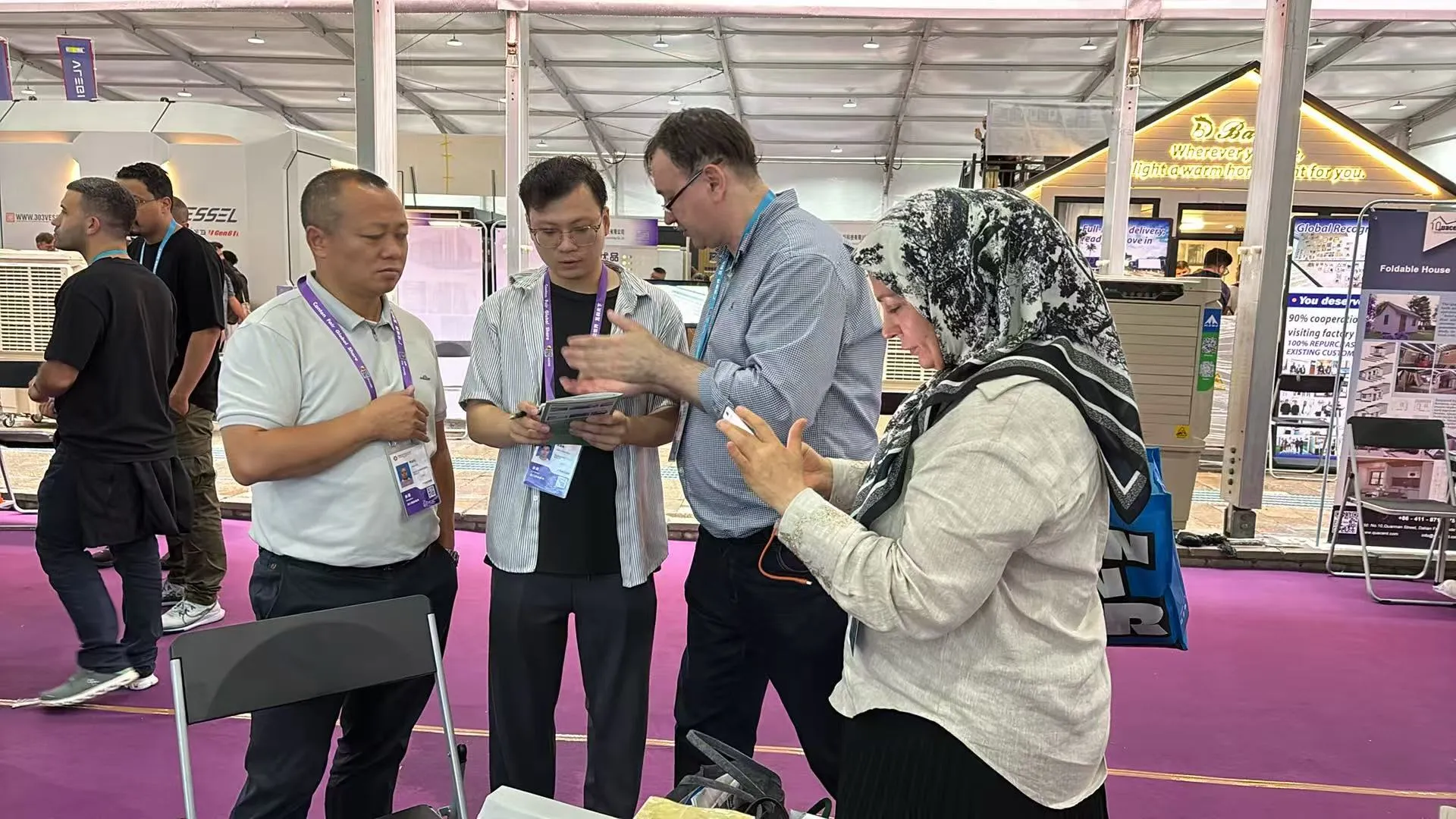 Customers discussing steel structure building projects with Foshan Bingfa