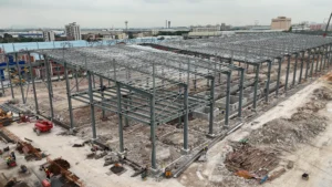 Steel columns in industrial buildings supporting roof beams and wide-span factory structure