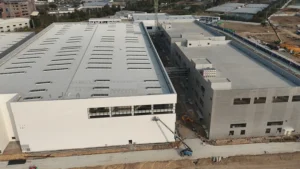 Purlins support roof and wall cladding and connect the building envelope to the main steel frame.