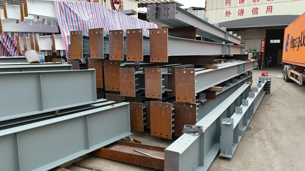 Fabricated steel beams for a steel repair workshop building