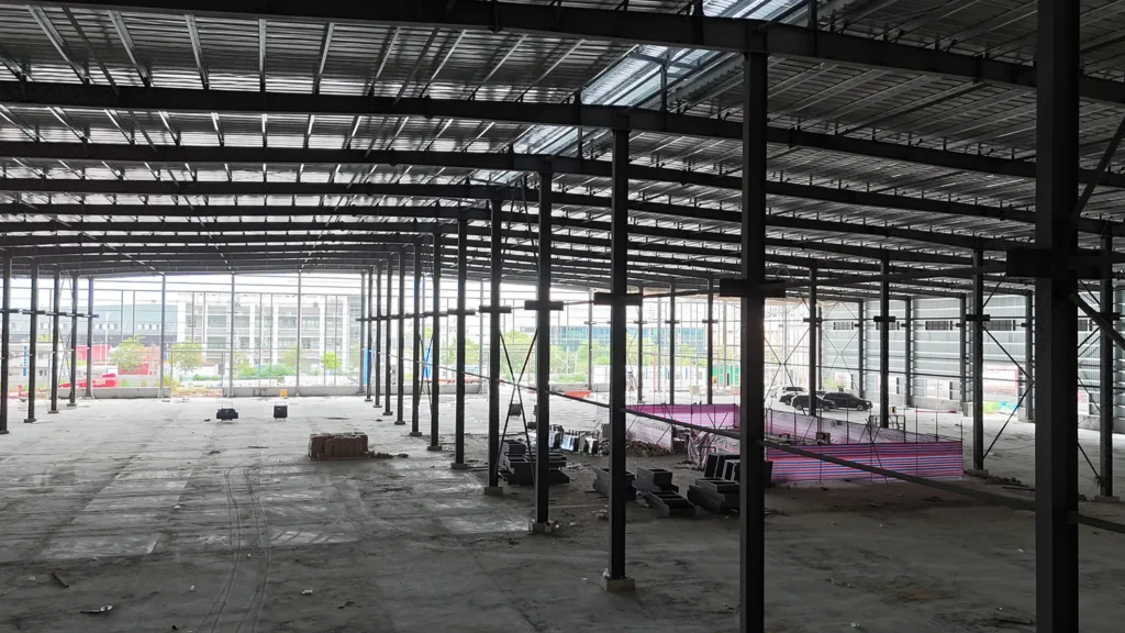 Steel equipment platform with stairs and guardrails for factory access