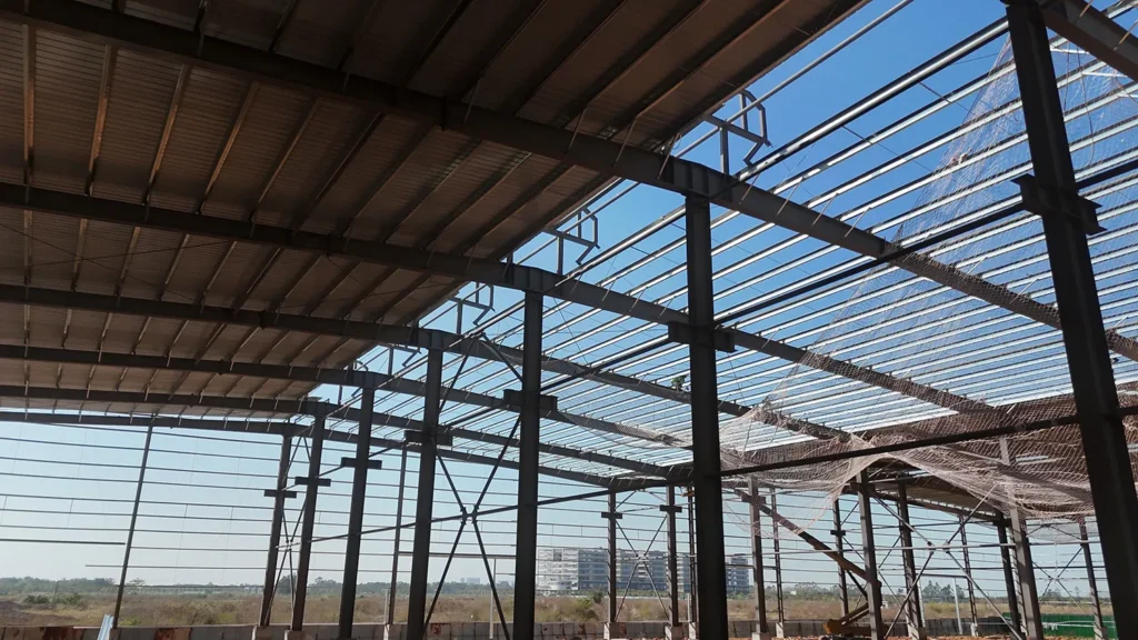 Roof frame and steel columns inside a steel structure factory building