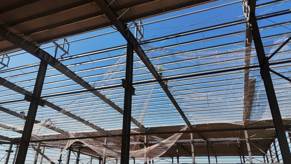 Roof panel installation progress on a steel structure factory building