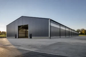 Steel building span shown by a wide completed industrial warehouse